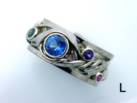 White Gold Vine and Trellis Ring with Central Round Sapphire and Colored Side Sapphires